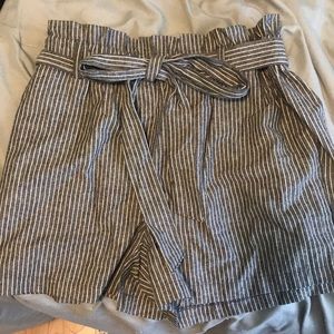 Grey and white stripped shorts.